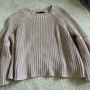tan sweater with wide sleeves